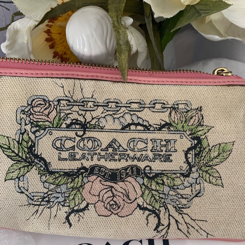 Limited Edition Coach Floral Canvas Wristlet Leather Trim and Bow
Charm - Picture 2 of 9